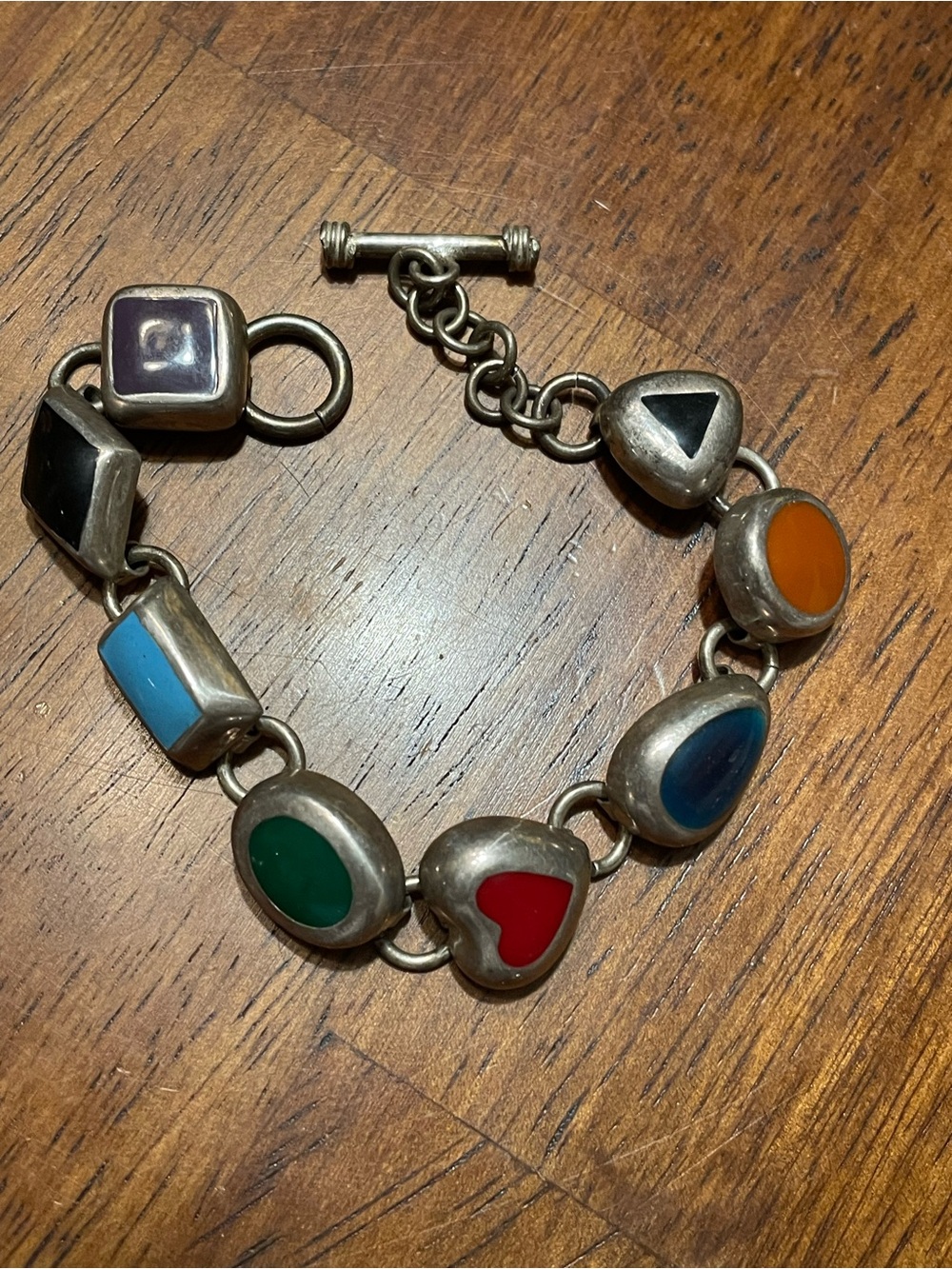 Sterling silver bracelet with jewel toned shaped links
